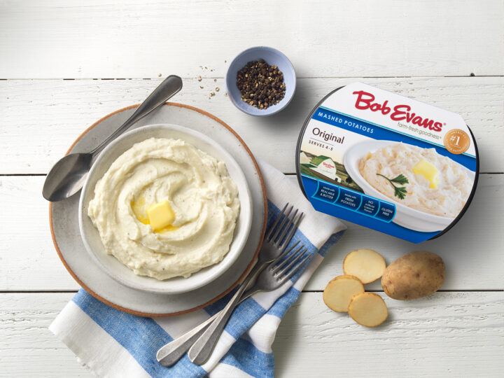 Bob Evans Original Mashed Potatoes packaging next to bowl of potatoes